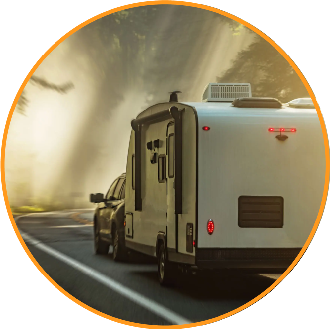 Car-towing-caravan-with-moody-sunlight-in-trees-MitchMarket-Finance